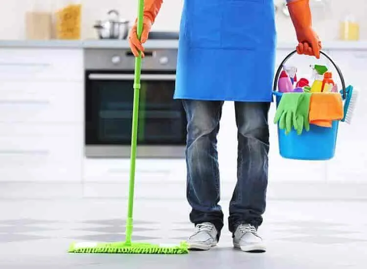 In-house housekeeping team cleaning resident rooms at Areca PG, Ahmedabad
