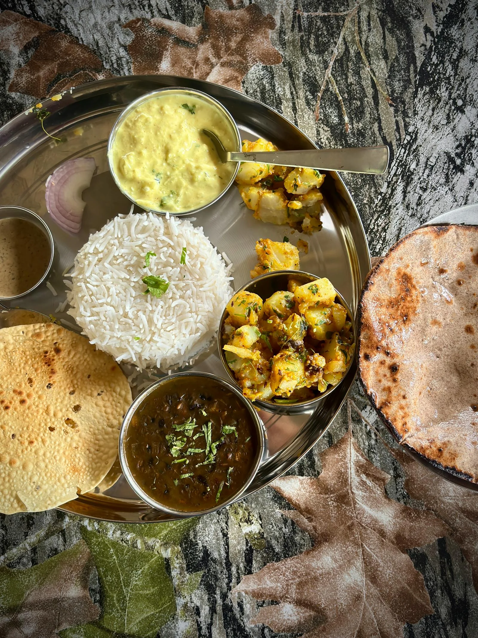 Four home-style vegetarian meals served daily at Areca PG, Ahmedabad