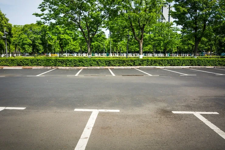 Covered parking with CCTV monitoring at Areca PG, Ahmedabad